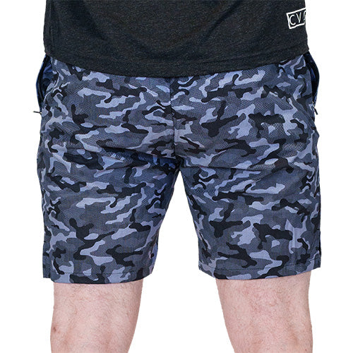 back view of black and grey camo quarter length unisex shorts
