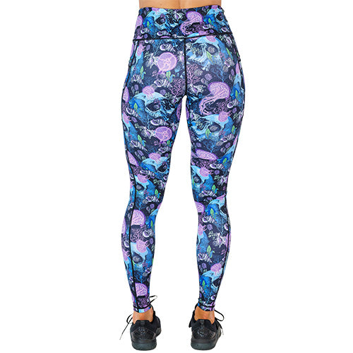 back view of full length purple jelly fish and blue skull print leggings