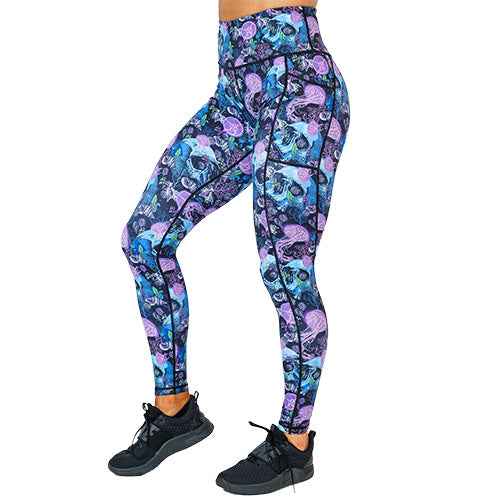 front view of full length purple jelly fish and blue skull print leggings