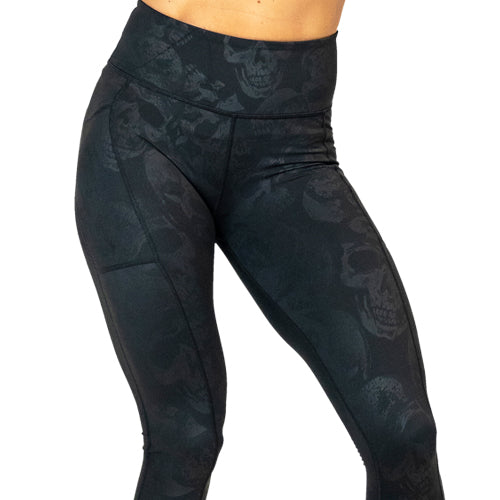 close up of black on black color skull print leggings