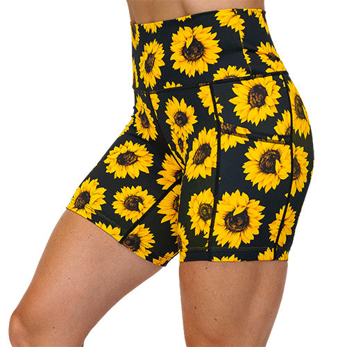 side view of yellow flower pattern on 5 inch shorts against a white background