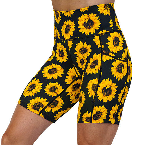 side view of yellow flower pattern on 7 inch shorts against a white background