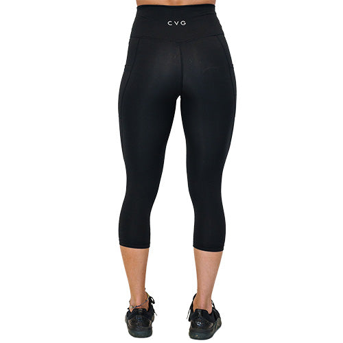 back view of capri length solid black leggings