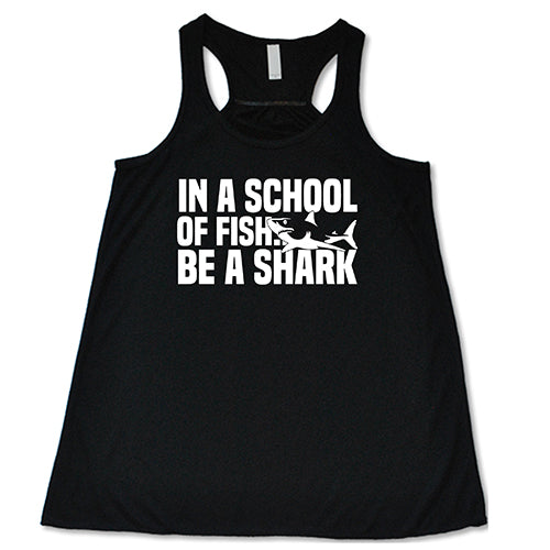 black racerback tank with the saying "in a school of fish... be a shark"