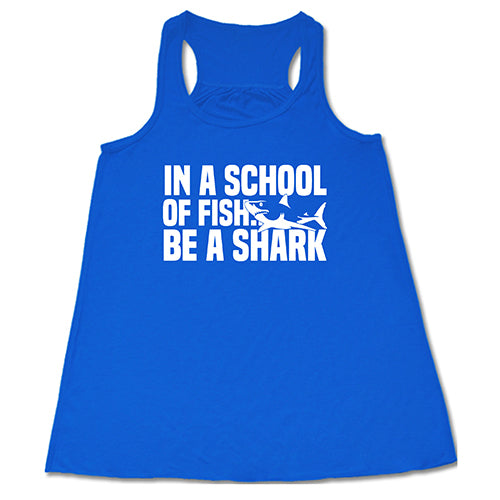 blue racerback tank with the saying "in a school of fish... be a shark"