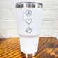 silver peace sign, heart and anarchy symbol on a white 30oz tumbler