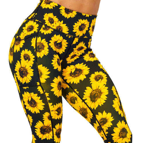 close up of sunflower print leggings