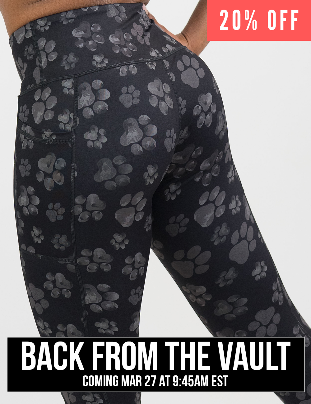 close up of the back of the grey paw prints against a black background leggings, coming soon and 20% off