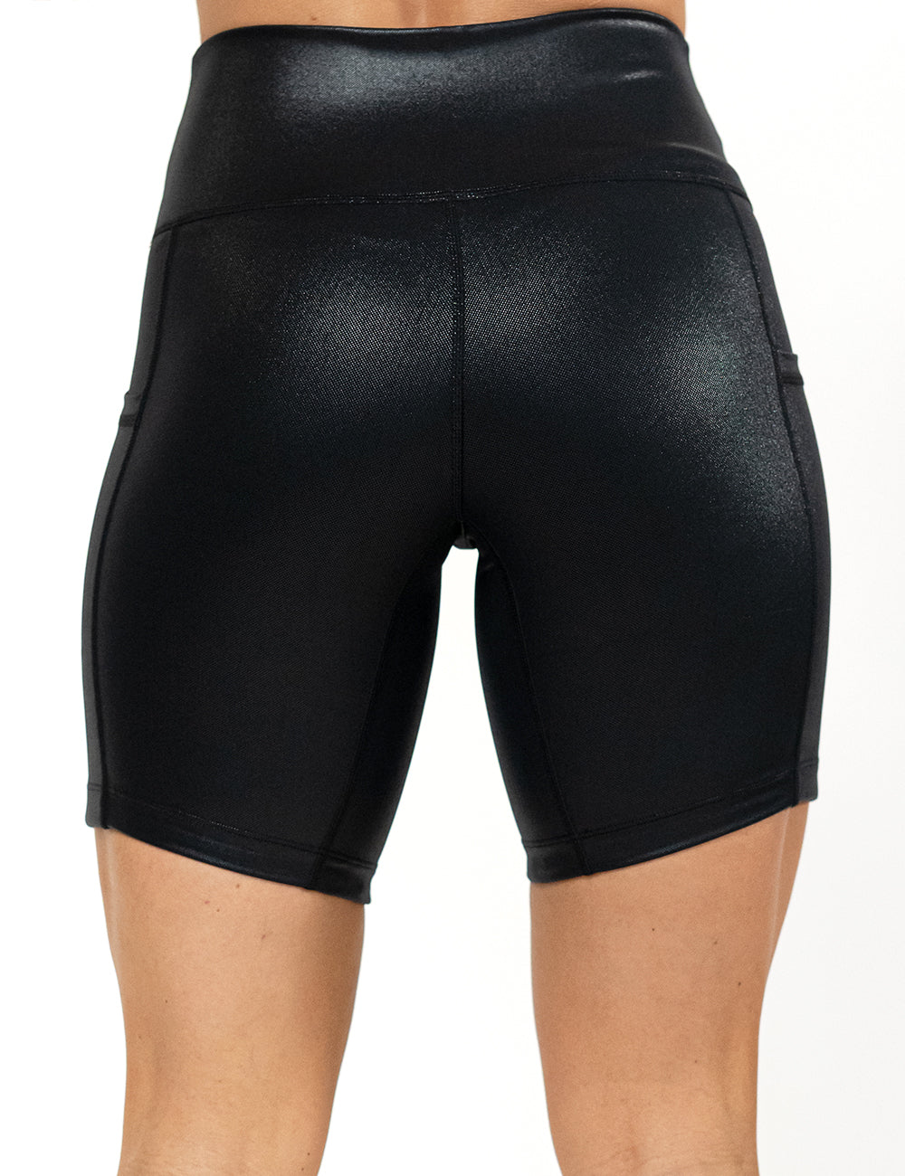 back of the 7 inch black leather shorts against a white background