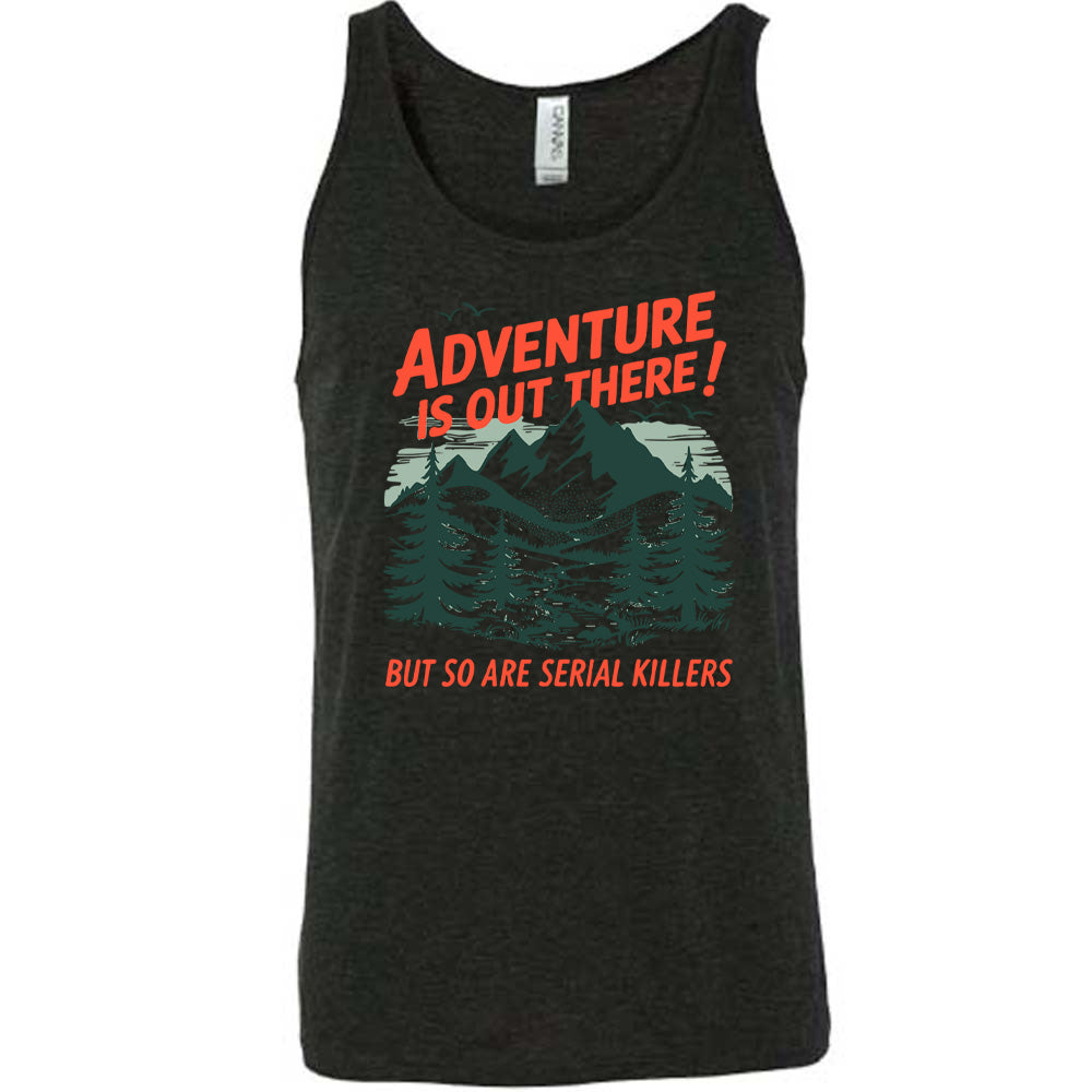 black unisex tank with the words "adventure is out there! but so are serial killers" on it, with the graphic of mountains and woods and birds flying 