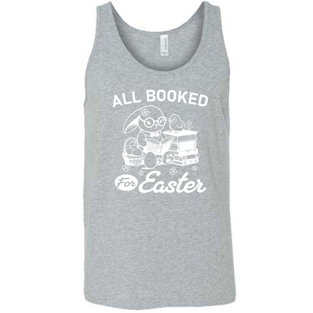 grey unisex tank with the words "all booked for Easter" on it, and the graphic of a bunny wearing glasses and a bowtie, reading a book, next to a stack of books (with a bird wearing glasses on top of it) on one side, and a basket of eggs on the other side