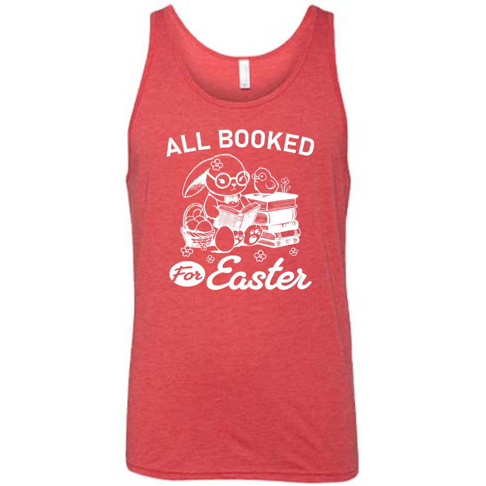 red unisex tank with the words "all booked for Easter" on it, and the graphic of a bunny wearing glasses and a bowtie, reading a book, next to a stack of books (with a bird wearing glasses on top of it) on one side, and a basket of eggs on the other side