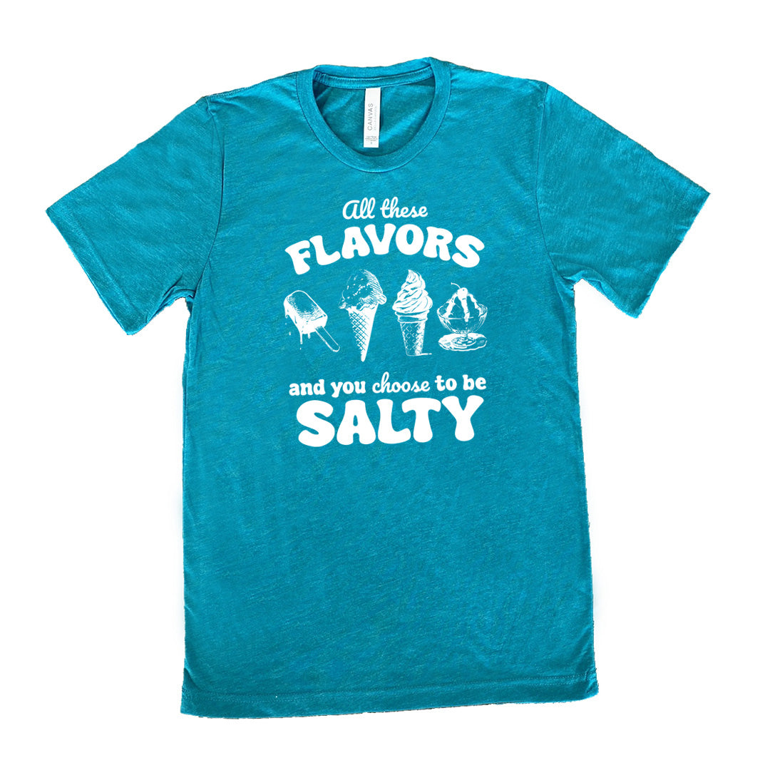 teal unisex tee with the words "all these flavors and you choose to be salty" on it, with graphics including a popsicle, two ice cream cones, and a sundae