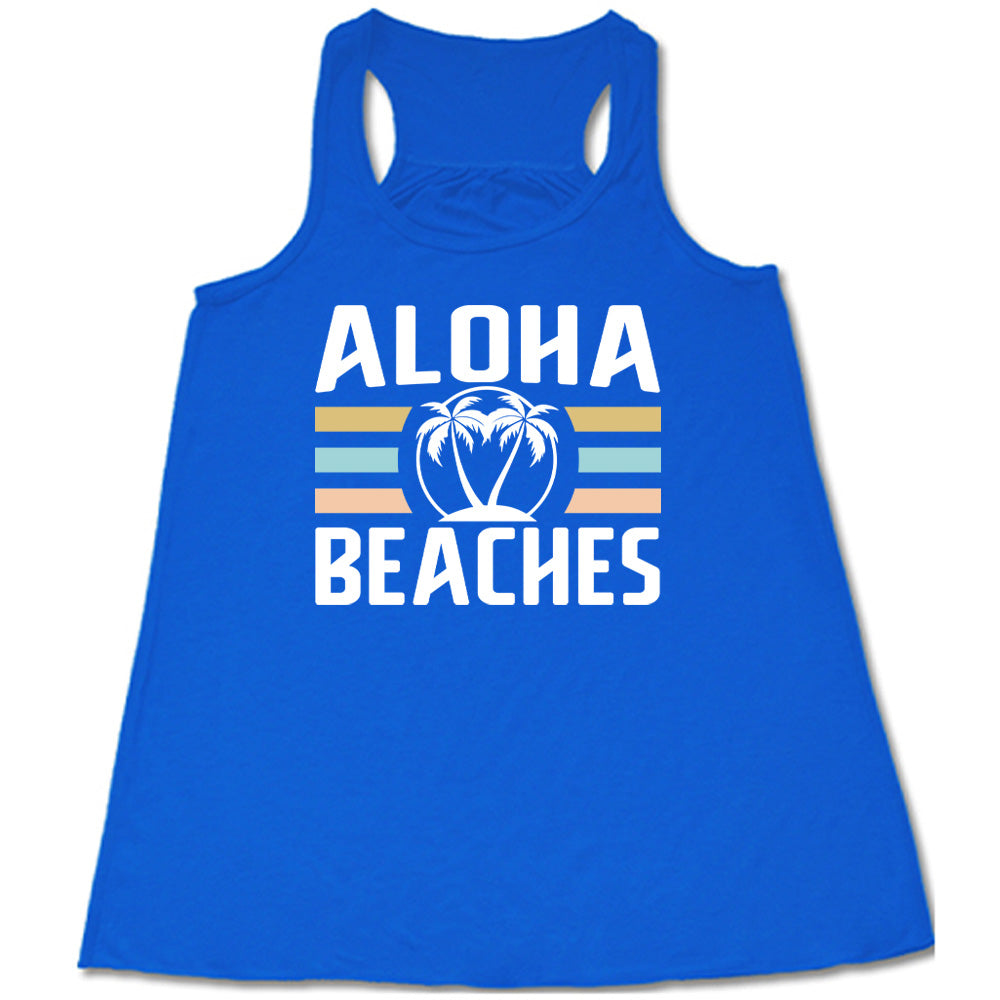 Blue colored flowy tank with a palm tree graphic on it that says "Aloha Beaches" 