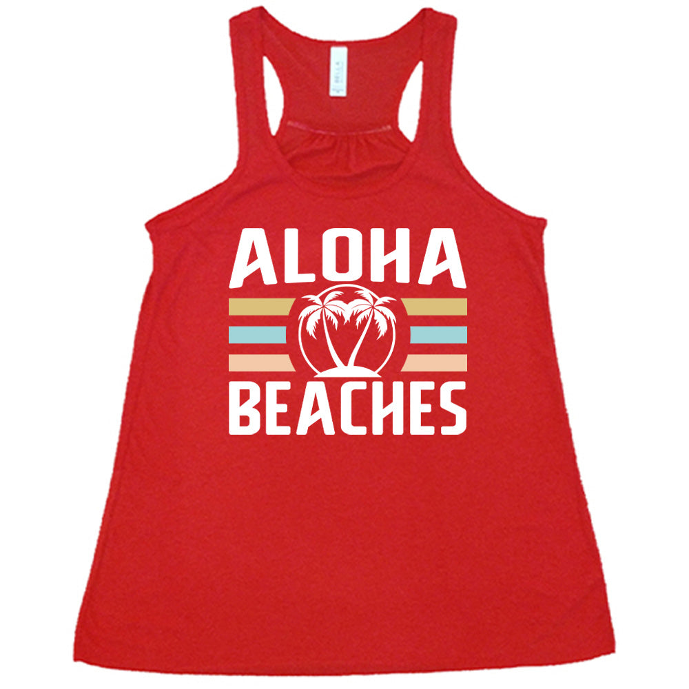 Red colored flowy tank with a palm tree graphic on it that says "Aloha Beaches" 