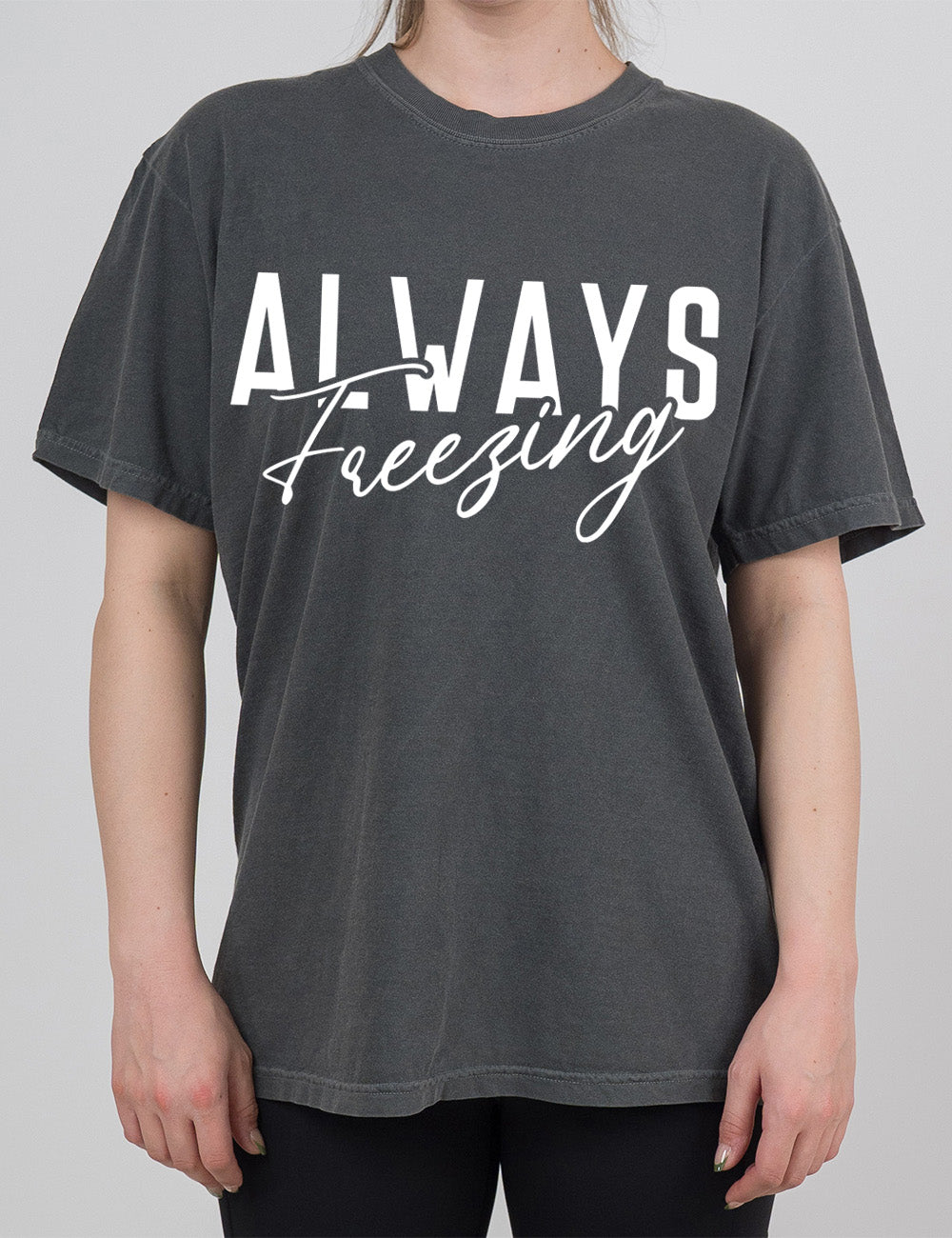 pepper modern tee with the word "always" in all capital letters with the word "freezing" in cursive, slightly overlapping it
