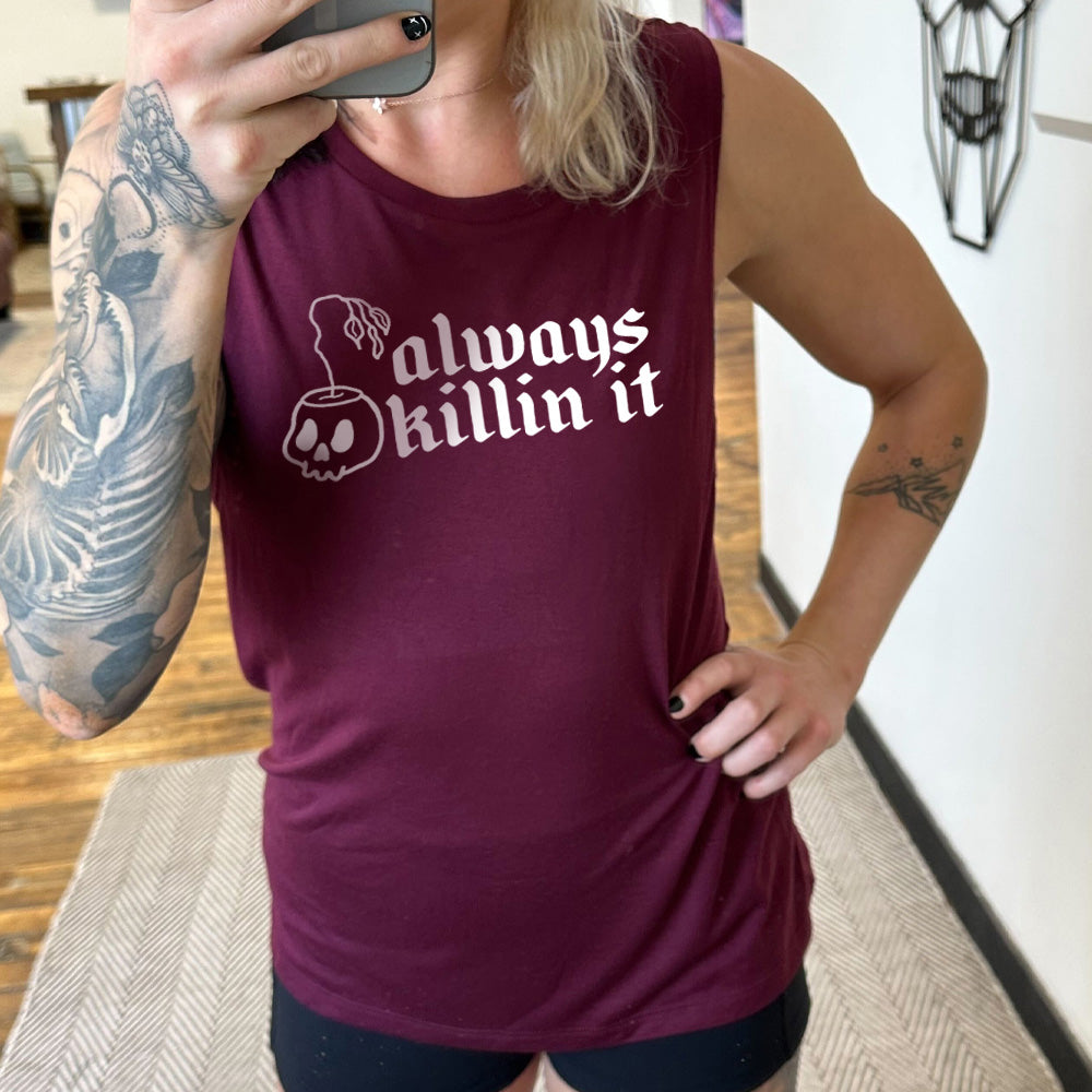 Model wearing maroon colored shirt with a wilting plant in a skull shaped pot graphic on it that says "Always Killin It"