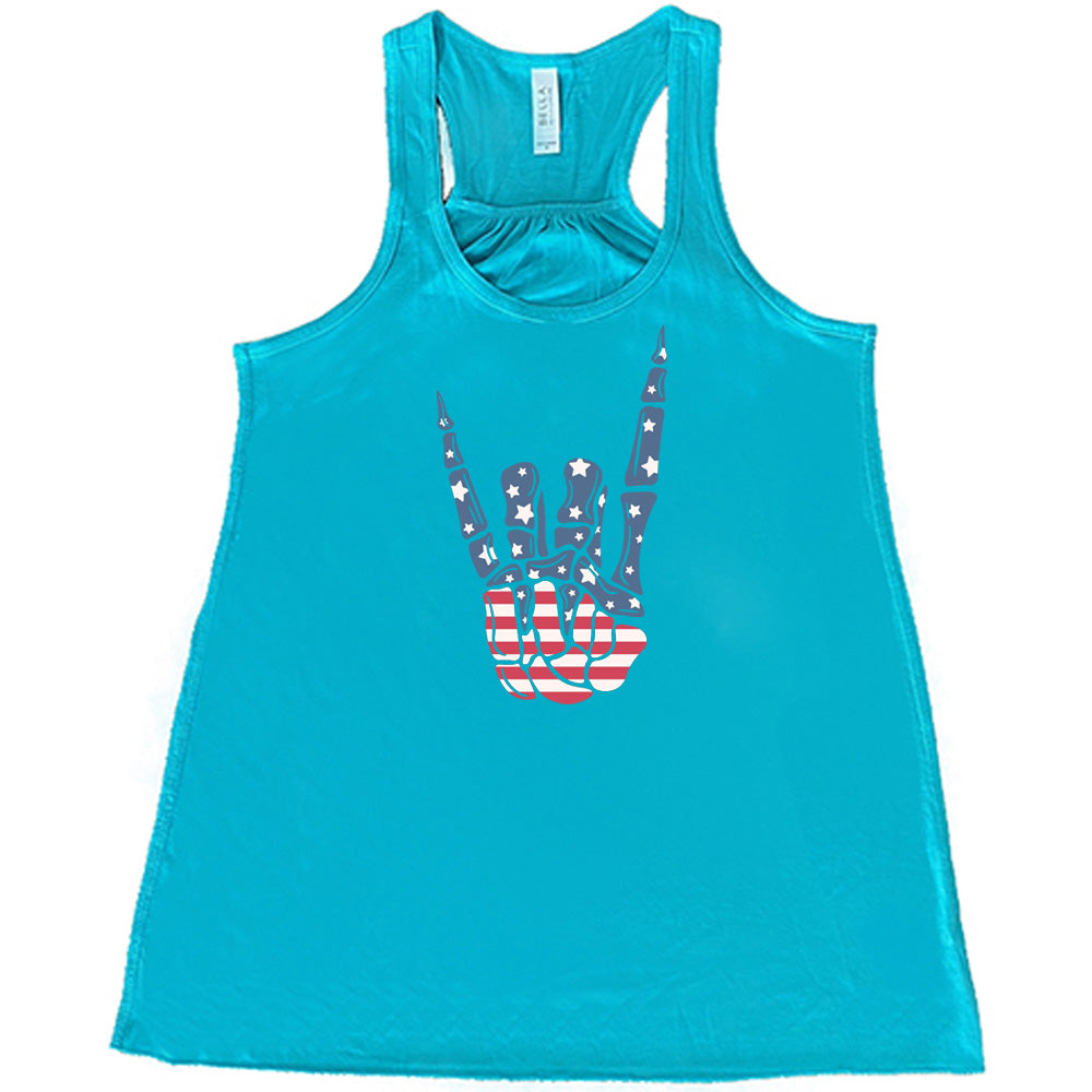 Teal colored flowy tank with an American flag skeleton hand graphic on it