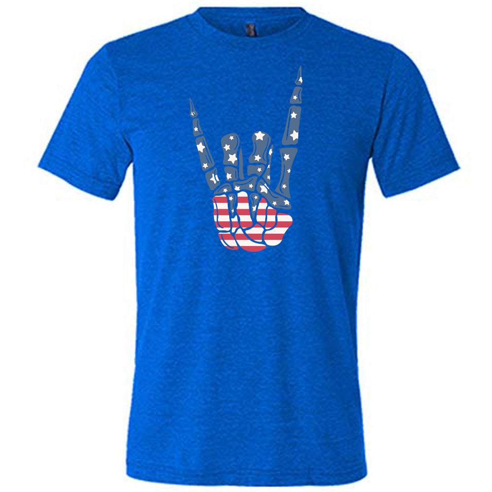 Blue colored shirt with an American flag skeleton hand graphic on it