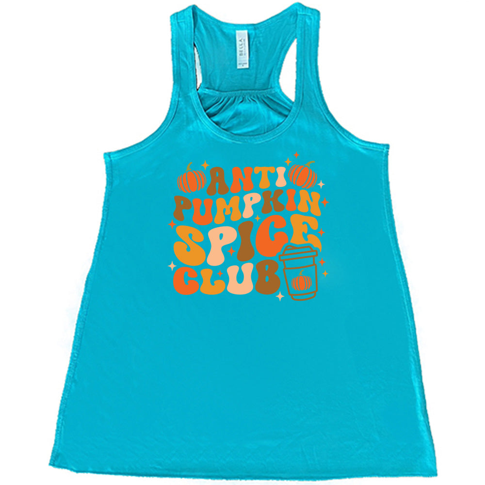 Teal colored flowy tank with pumpkin and hot drink cup graphic on it that says "Anti Pumpkin Spice Club" 