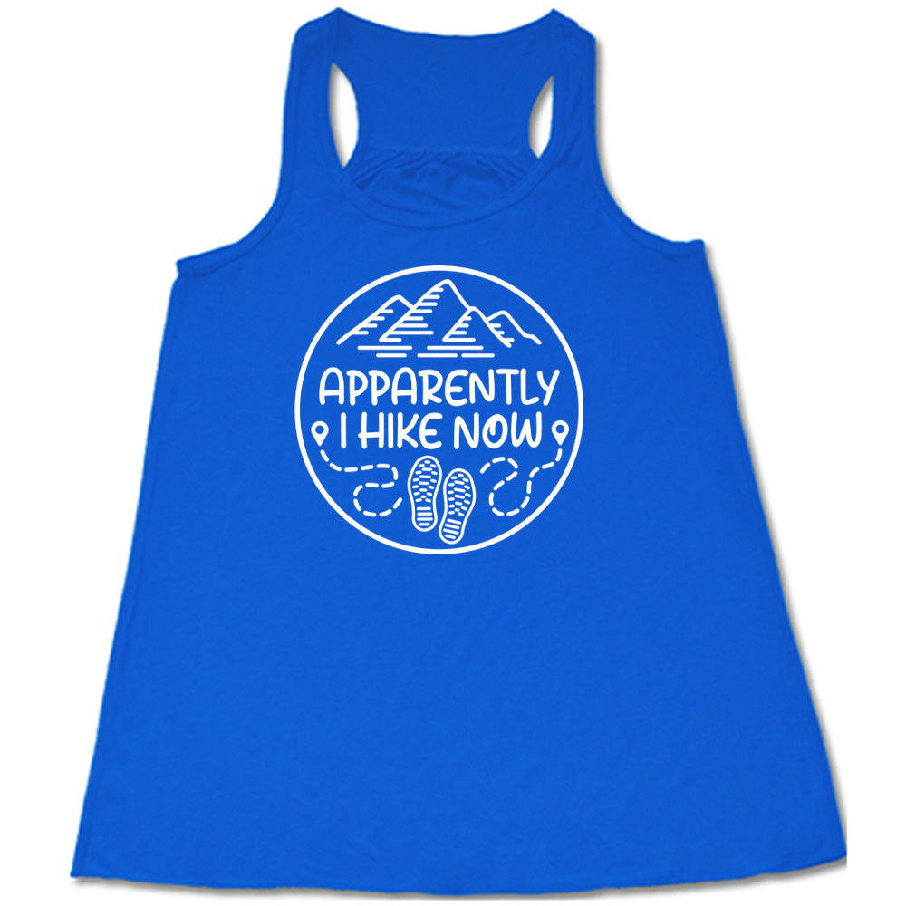 Blue colored flowy tank with a mountain and shoes graphic on it that says "Apparently I Hike Now" 