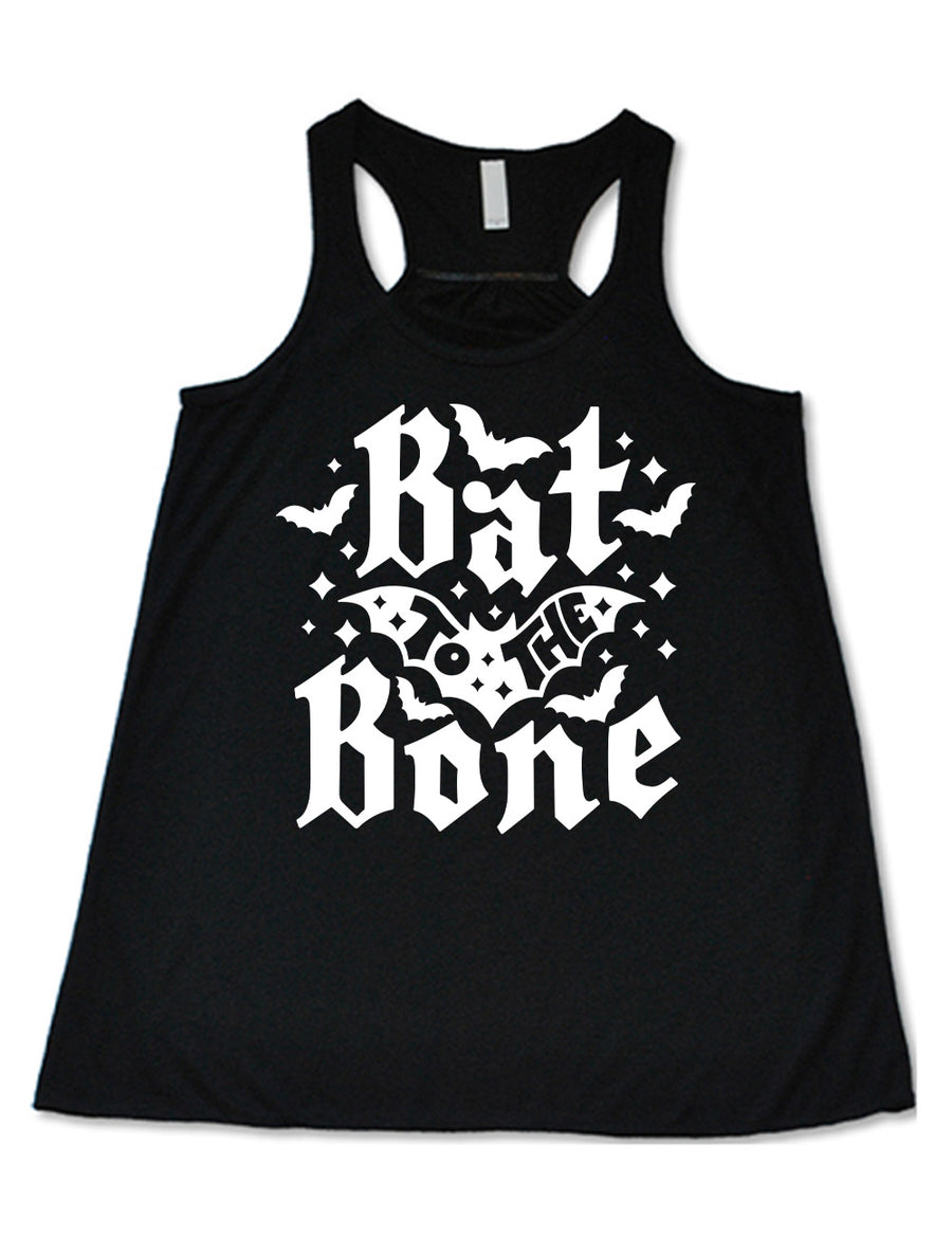 black flowy racerback tank with the words "bat to the bone" on it, with the words "to the" on top of a bat, and a number of other bats around the words, as well as some stars