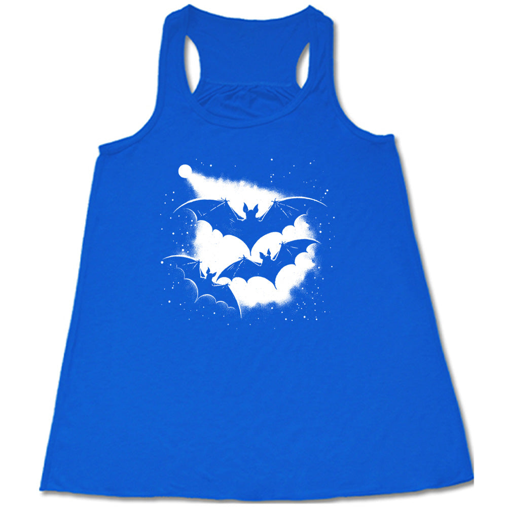 Blue colored flowy tank with bats silhouette graphic on it