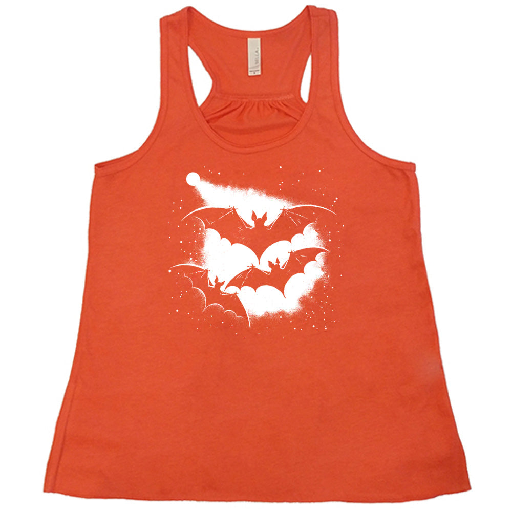 Coral colored flowy tank with bats silhouette graphic on it