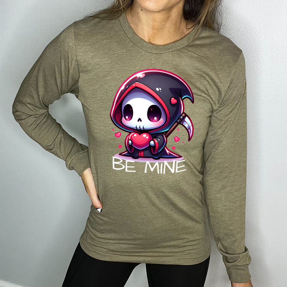 heather olive long sleeve with large graphics of a cartoony grim reaper holding a heart, with little hearts surrounding, and the words "be mine" on it