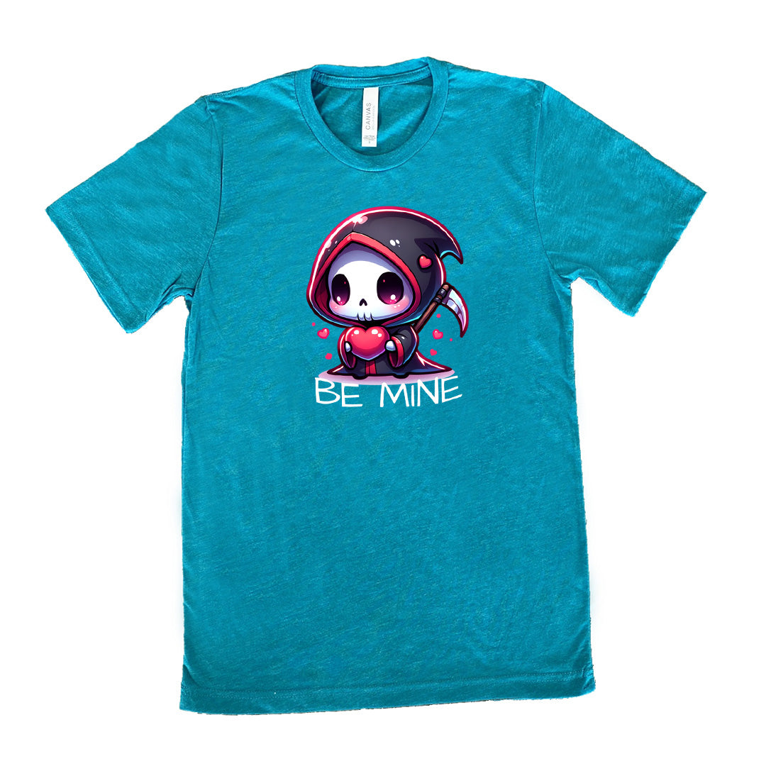 teal unisex tee with large graphics of a cartoony grim reaper holding a heart, with little hearts surrounding, and the words "be mine" on it