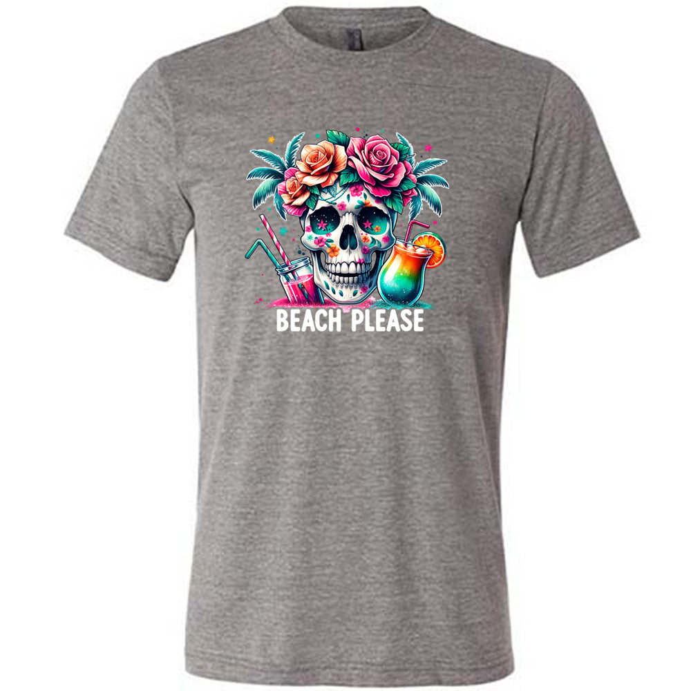 Grey colored shirt with a flowery skull and drinks graphic on it that says "Beach Please" 