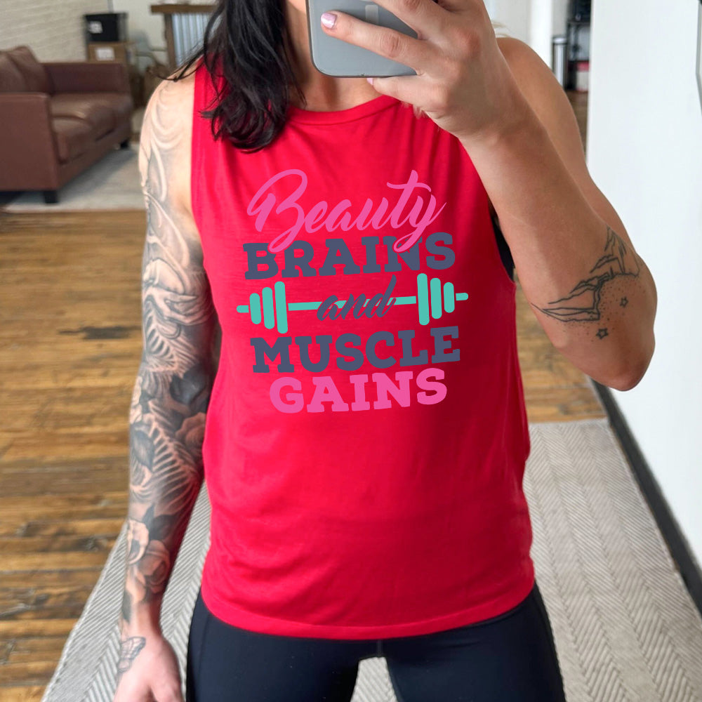 Red Muscle Tank, with wording Beauty Brains and Muscle Gains, with a barbell