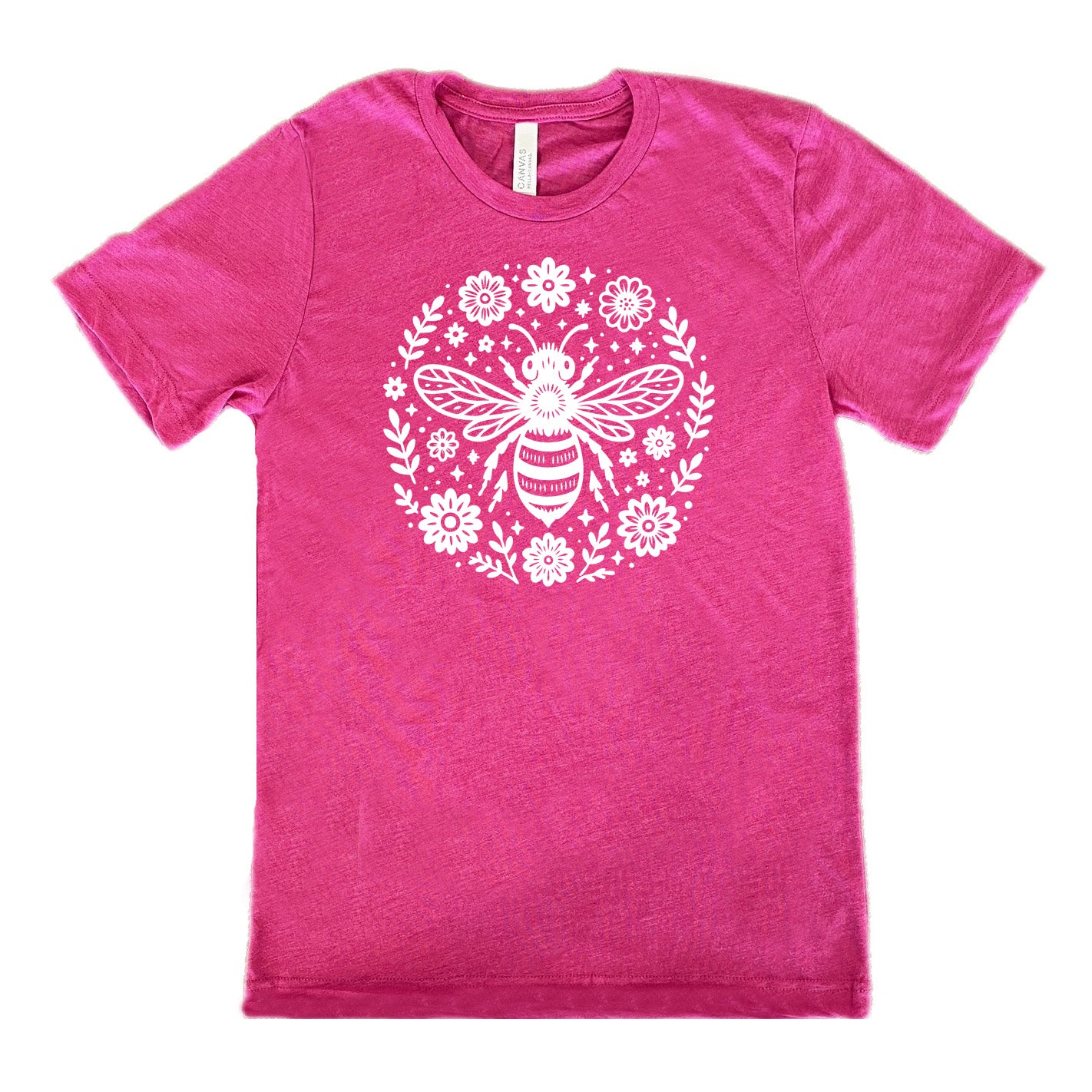 berry unisex tee with the graphic of a boho circled design filled with flowers of varied size, some branches, some stars, and in the center a fancy bee