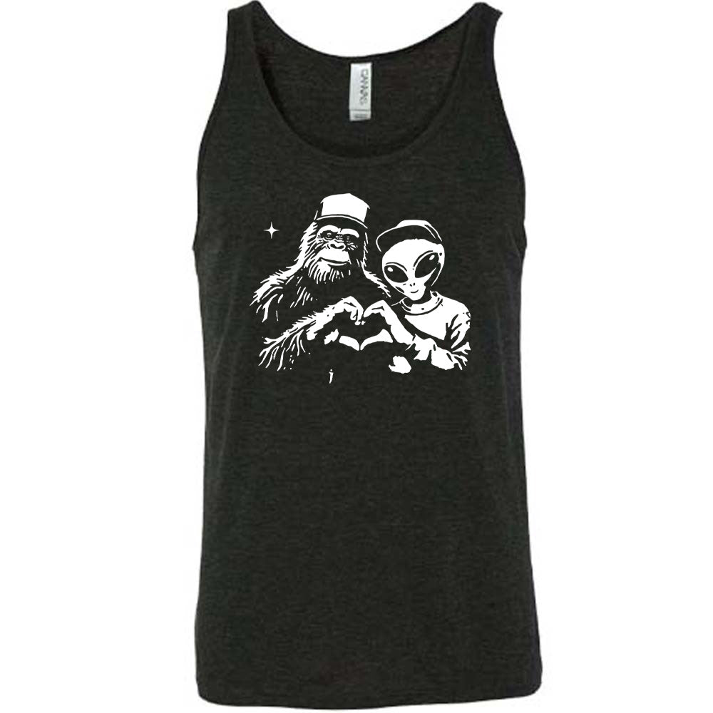 Black colored tank with bigfoot and alien doing heart hands graphic on it