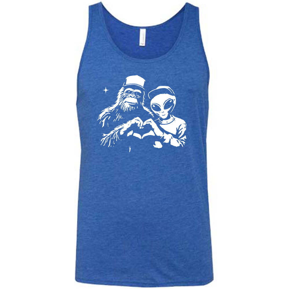 Blue colored tank with bigfoot and alien doing heart hands graphic on it