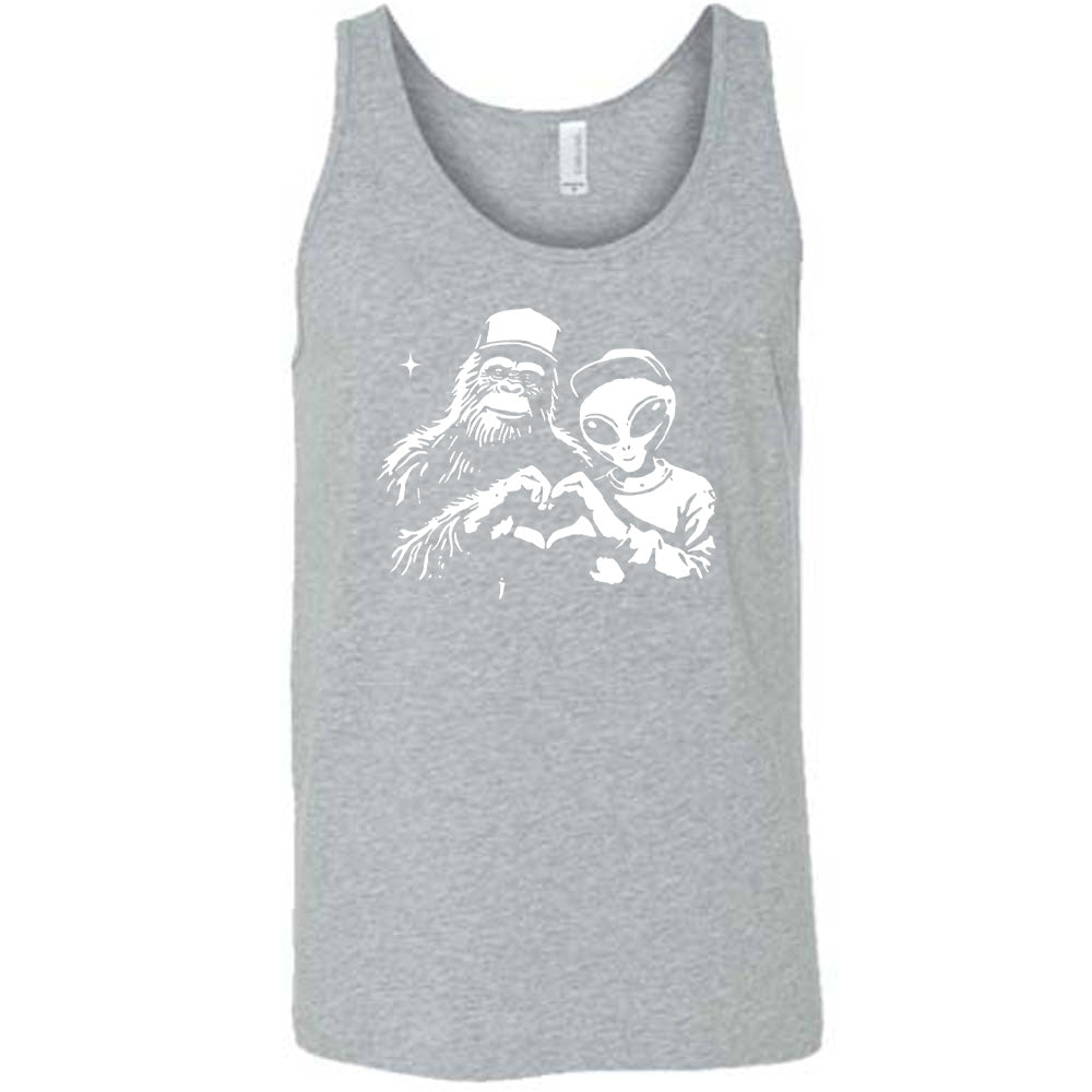 Grey colored tank with bigfoot and alien doing heart hands graphic on it
