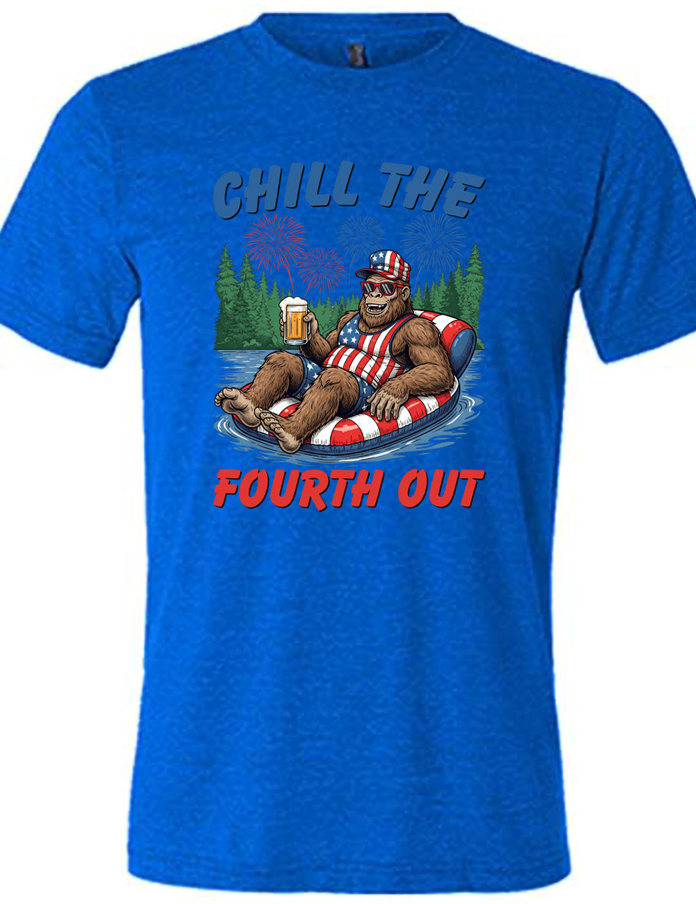 blue unisex tee with the graphic of a grinning Bigfoot holding a beer, wearing sunglasses and an American flag outfit, in an American flag tube, in the water, with a background of trees, with fireworks above, and the words saying "chill the fourth out" on it