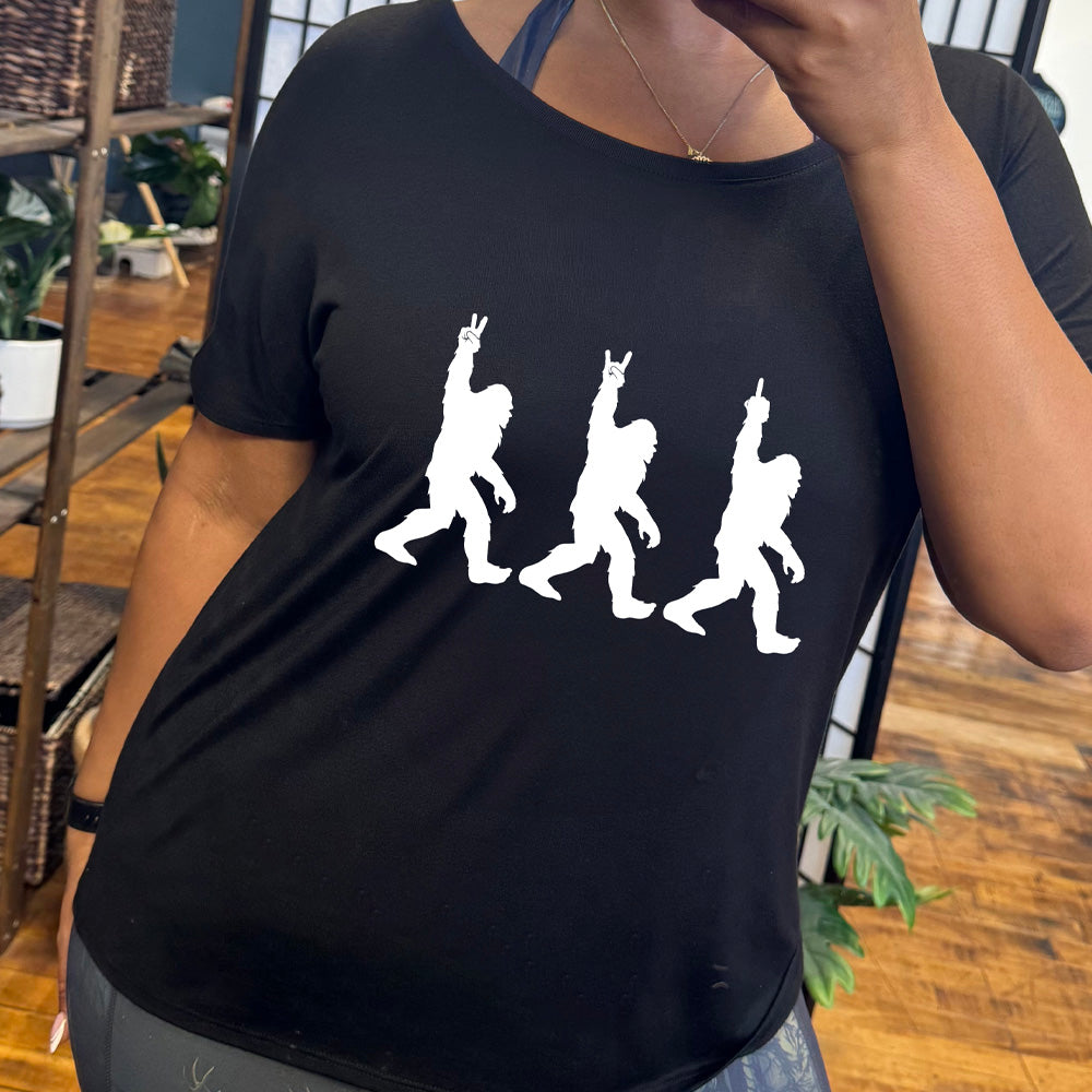 shirt with bigfoot doing peace sign graphic on it