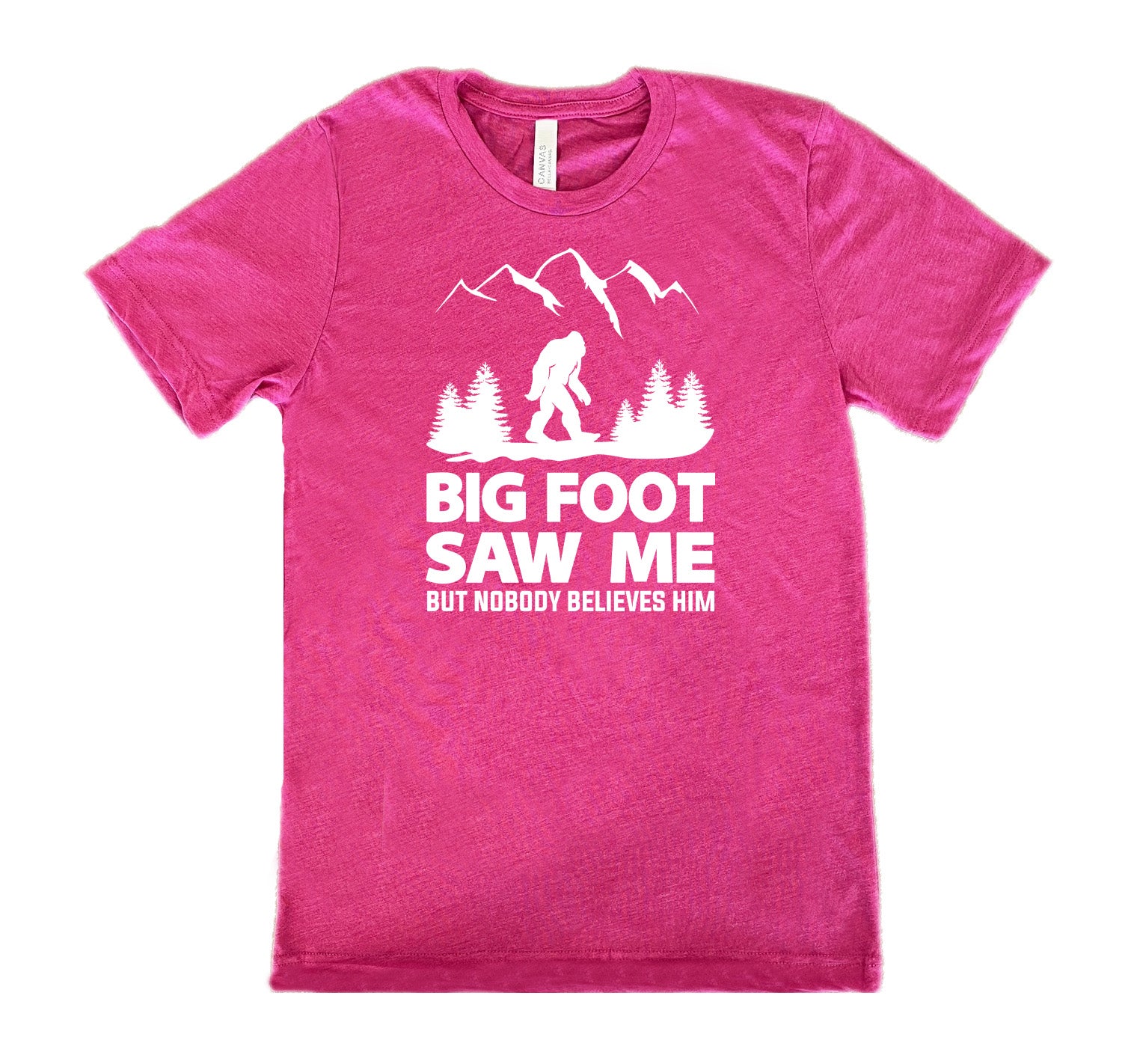 Berry colored shirt with bigfoot in the woods graphic on it that says "Bigfoot Saw Me But Nobody Believes Him"