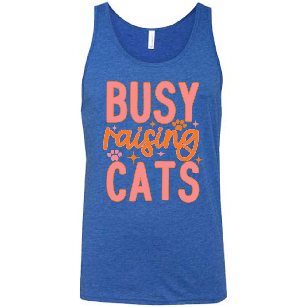 blue unisex tank with the words "busy raising cats" on it, with graphics of a couple small paw prints and a number of little stars