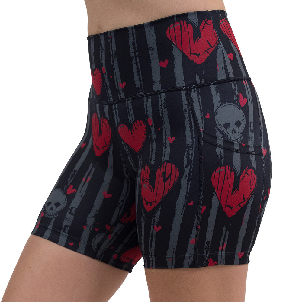 red heart and gray skulls against a black and grey striped background 5 inch shorts facing the front against a white background