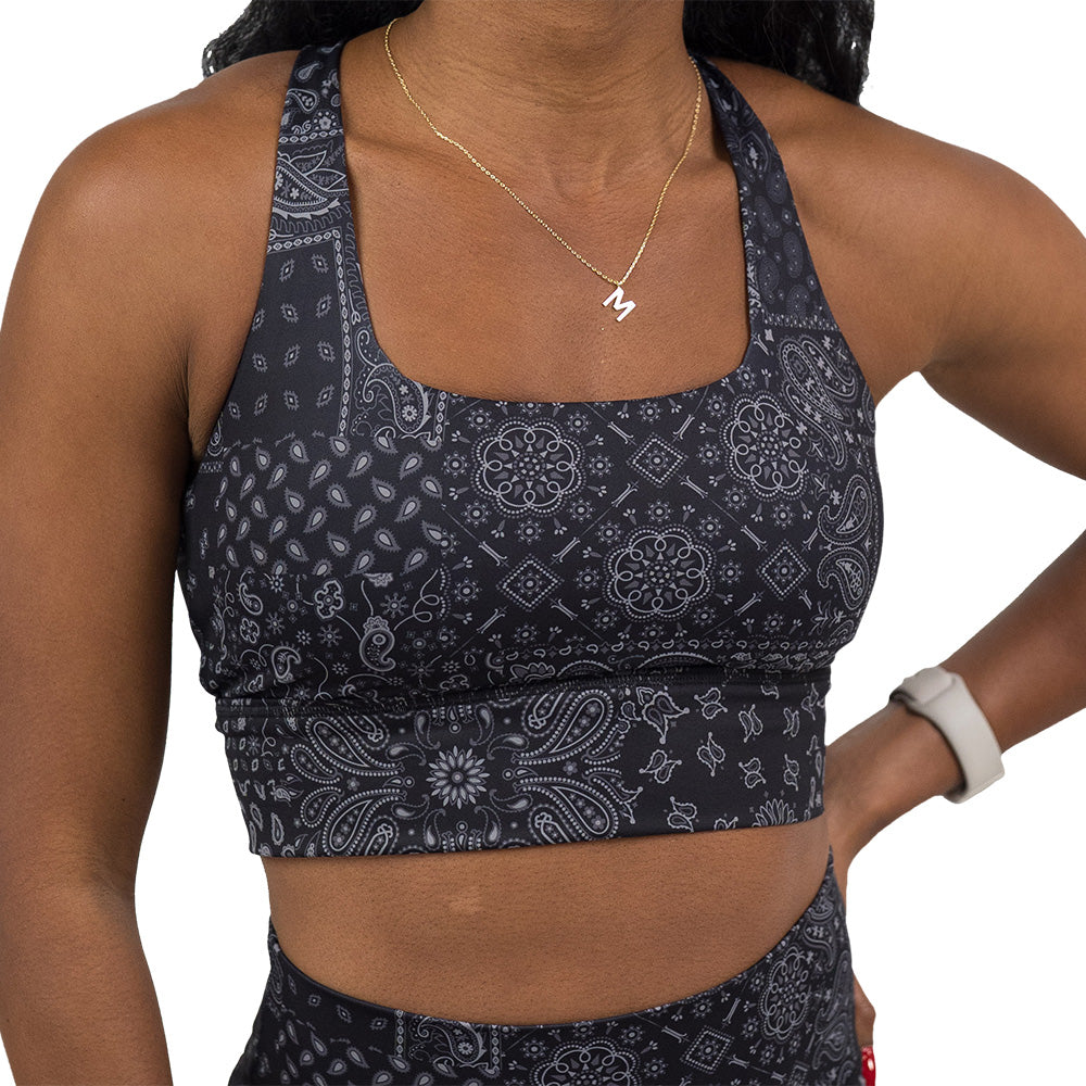 black paisley patterned sports bra