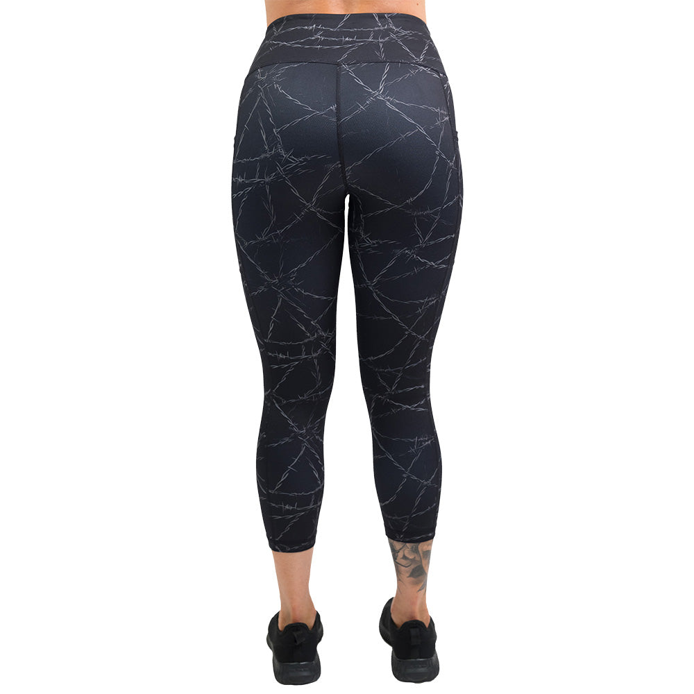 back of the black leggings with a white barbed wire pattern on it