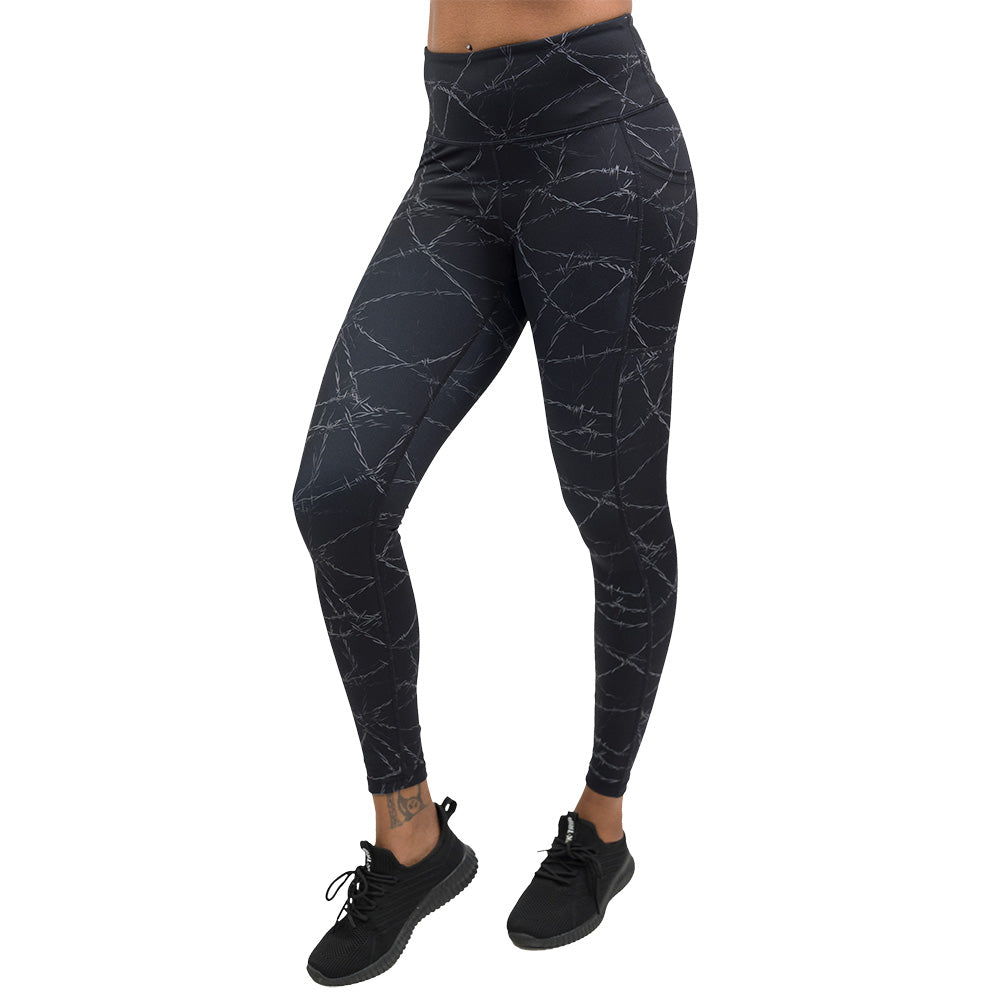 black leggings with a white barbed wire pattern on it