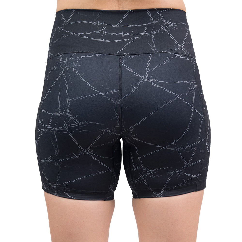 back of the black shorts with a white barbed wire pattern on it