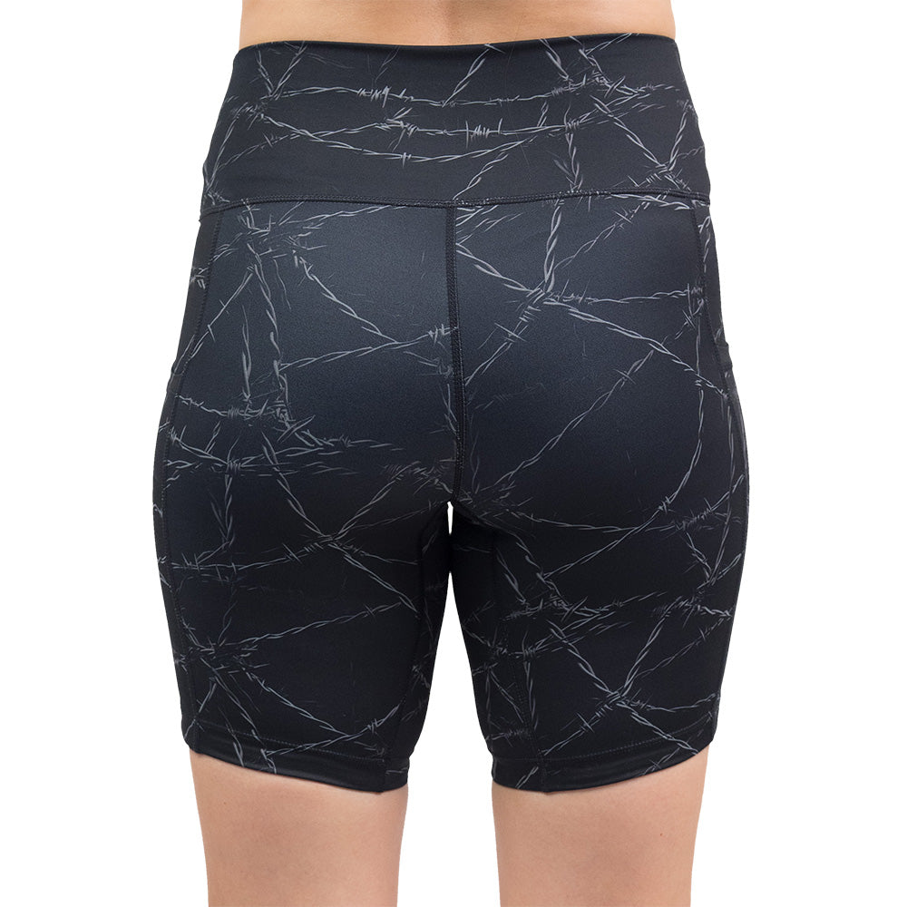 back of the black shorts with a white barbed wire pattern on it