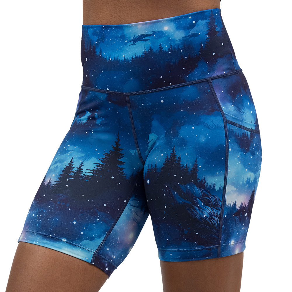 blue sky and forest patterned shorts
