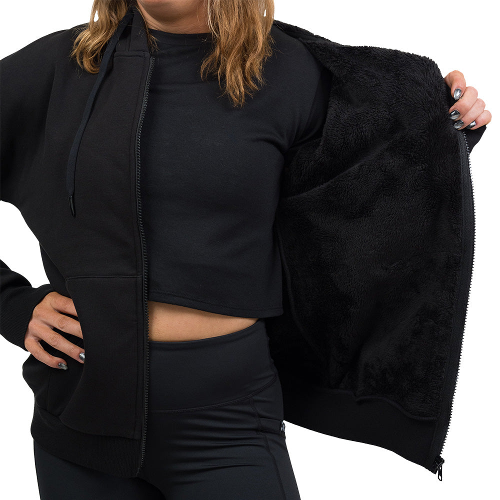 close up of the fleece inside the black fleece zip up