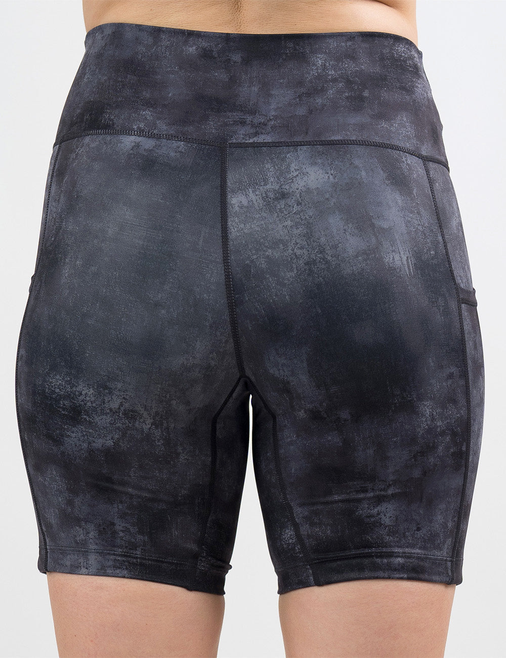 back of the 7 inch black and grey grunge concrete pattern shorts against a white background