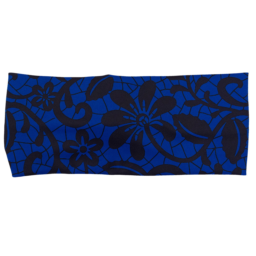 front of the black floral against a dark blue background